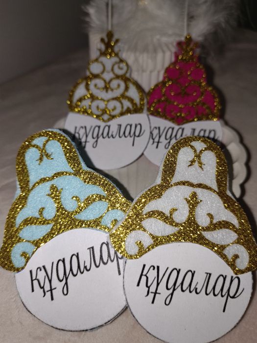 Значки құдалар төсбелгі