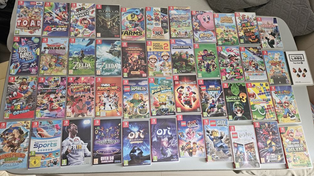 Vand Nintendo Switch OLED + 45 jocuri