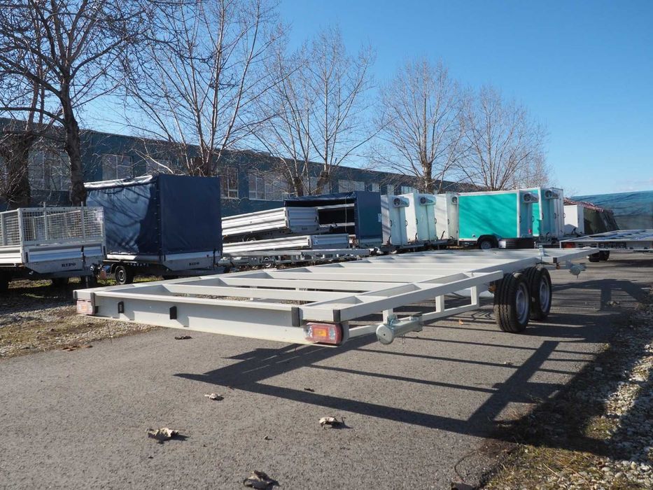 Platformă auto pentru montare container