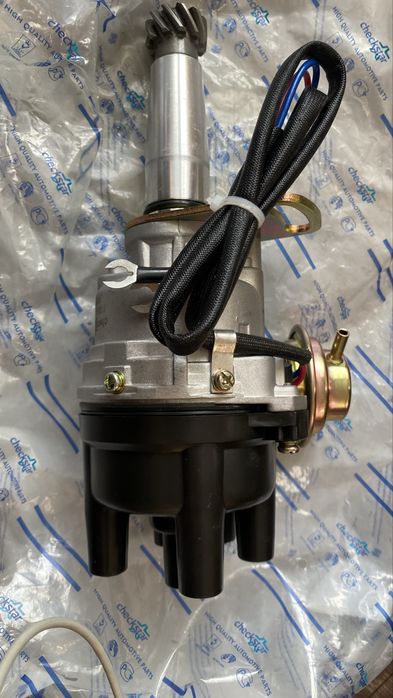 Трамблер 1,8 обёмь мазда