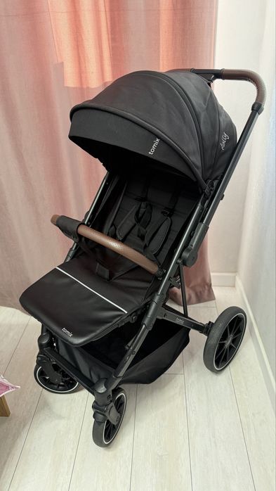 Продам прогулочную коляску Tomix Kelly