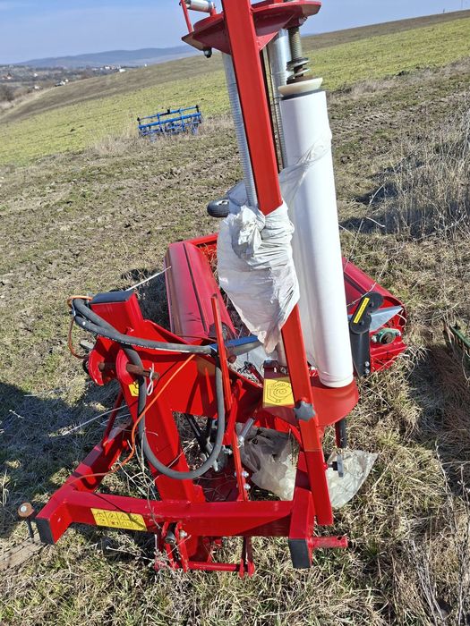 Infoliator și clește pentru baloți de siloz