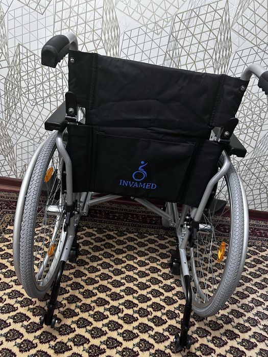 Инвалидная коляска