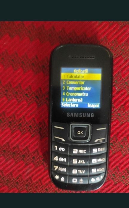 Telefon mobil cu taste in bună stare de funcționare, bateria a fost schimbată.