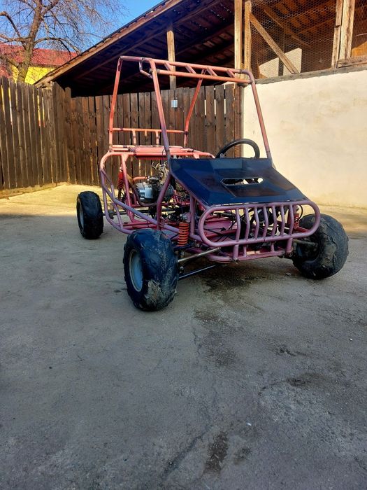 Vând skimb buggy în stare bună
