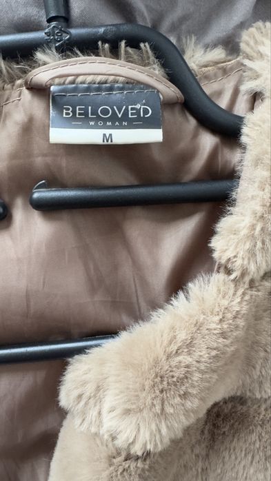 Пухкав кафяв елек