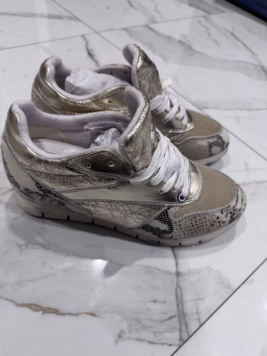 Кожаные кроссовки в отличном состоянии