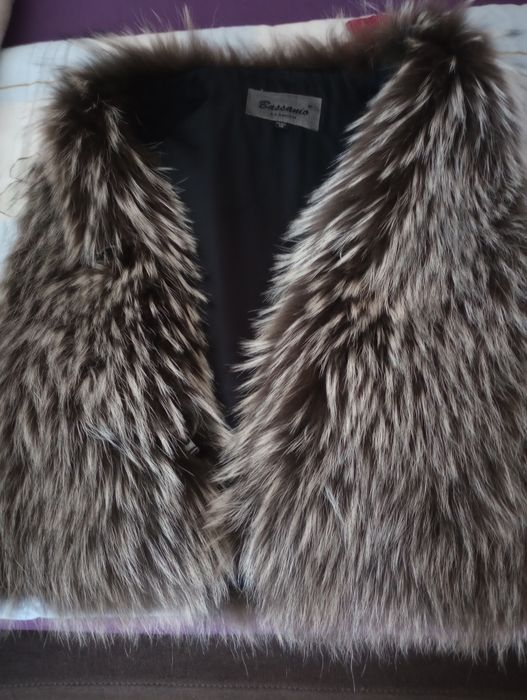 Vesta de blana dama
