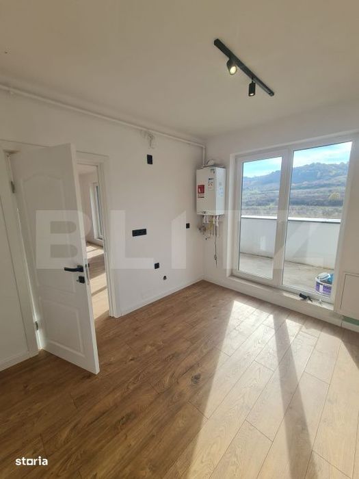 Apartament finisat, 52 mp utili, terasa 34 mp, zona Terra