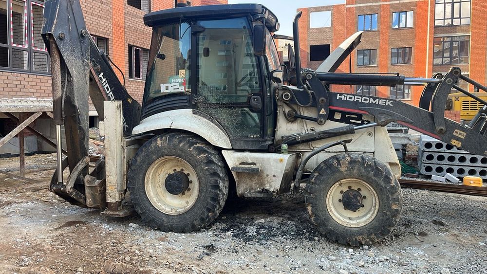 Экскаватор-погрузчик 2011 г.в