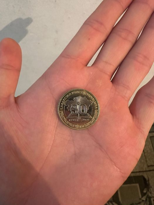 Монета 100 тенге