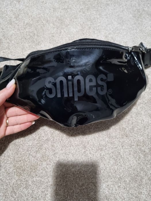 Borseta de la Snipes
