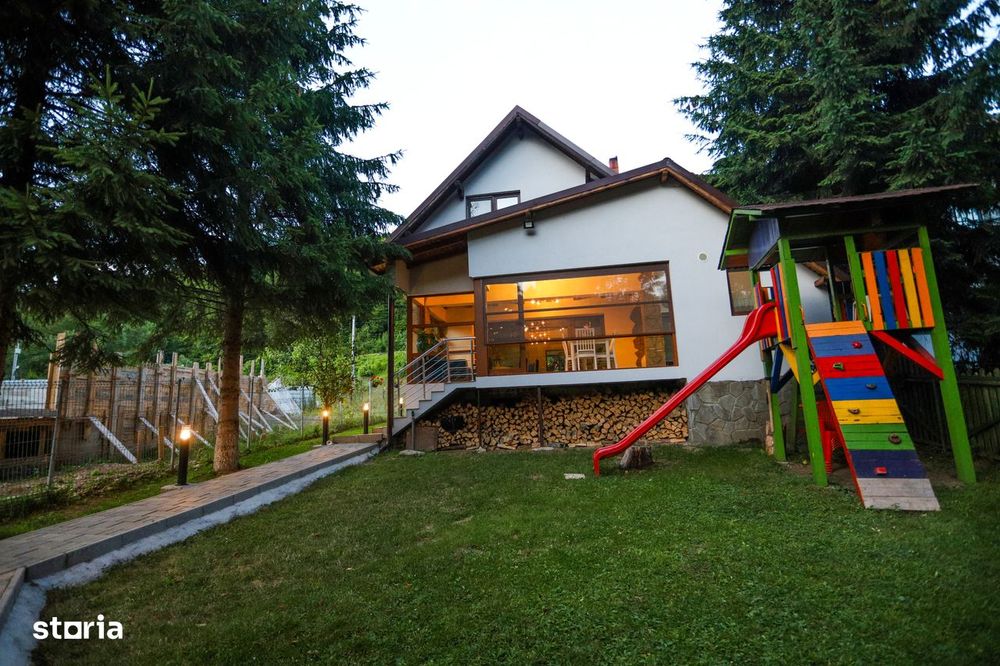 Vilă de Lux pe Malul Lacului – Confort și Vedere Panoramică