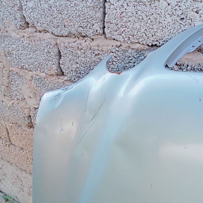 Капот от 210 рест 2001г