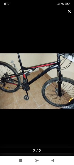 Bicicleta aproape noua