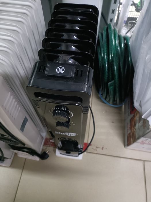 Масляной радиатор, обогреватель