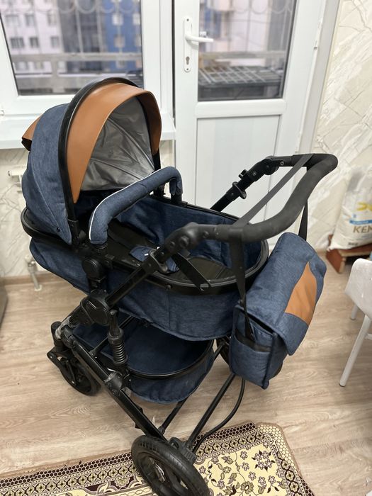 Коляска почти новая Teknum