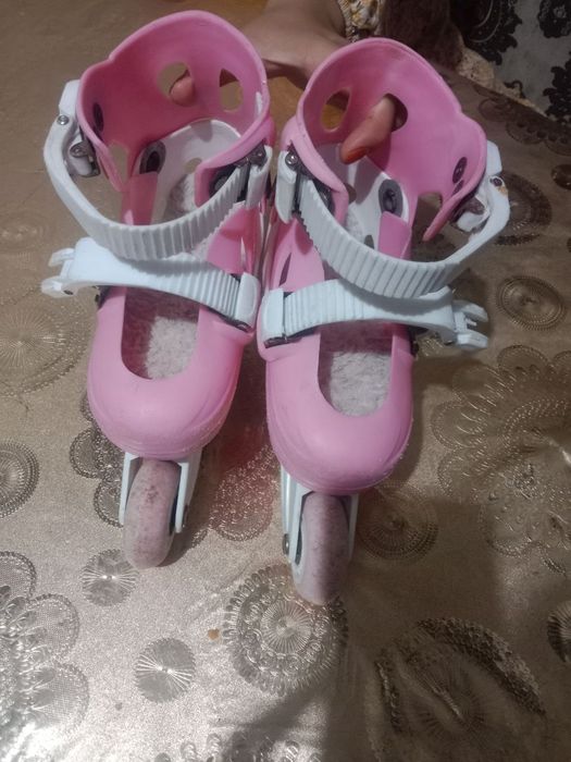 Роликовые коньки