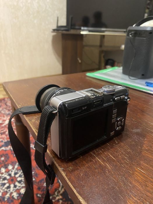 Беззеркальная камера серии Olympus PEN.