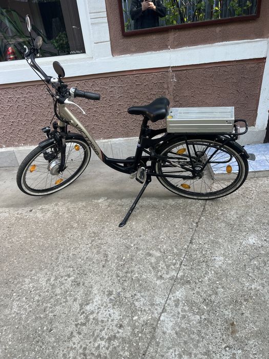 Bicicleta electrica Victoria cu acceleratie la mana