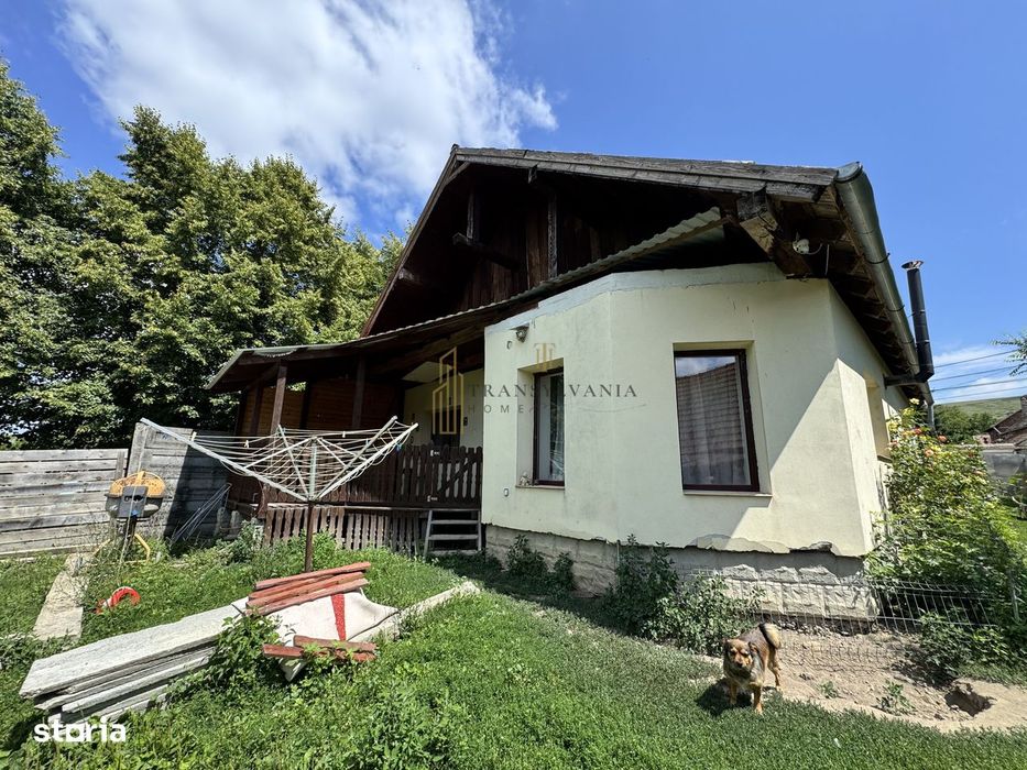 Casă la țară cu teren generos în satul Ruși
