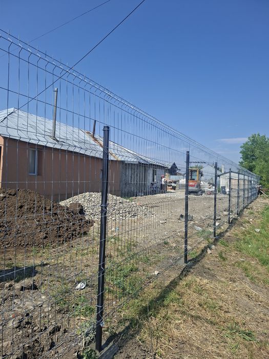 Executam garduri si porti