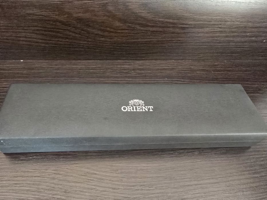 Мужской часы orient