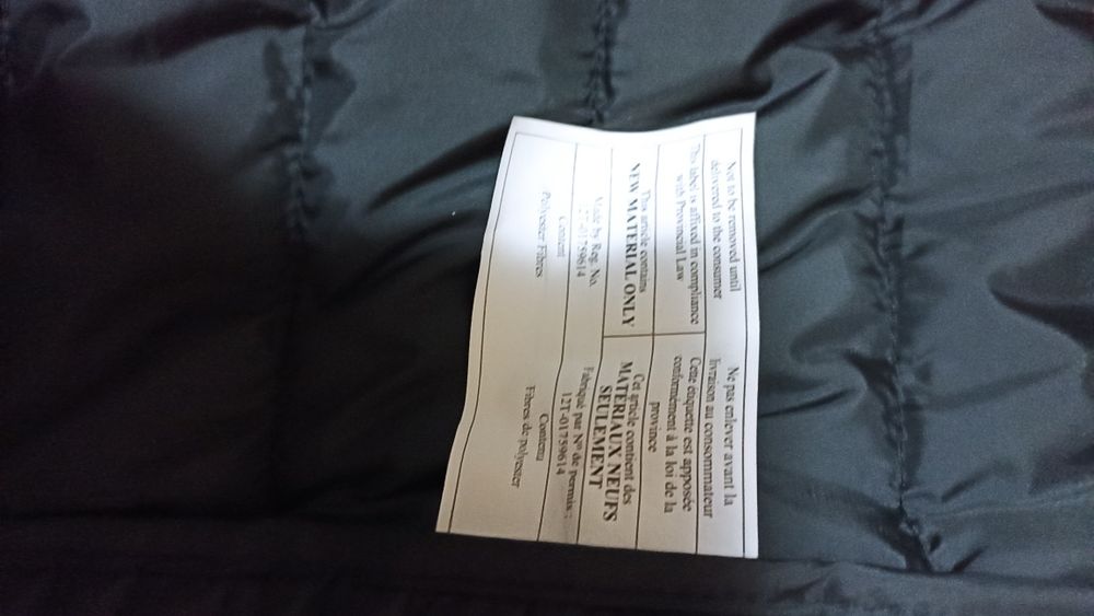 Продам фирменную куртку -пуховик.