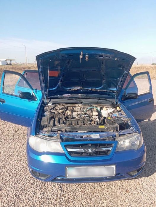 Daewoo Nexia, 2011 г Ярко-синий