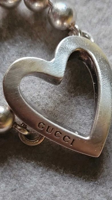 Inel Gucci din argint, cu margele si inima, fabricat in Italia
