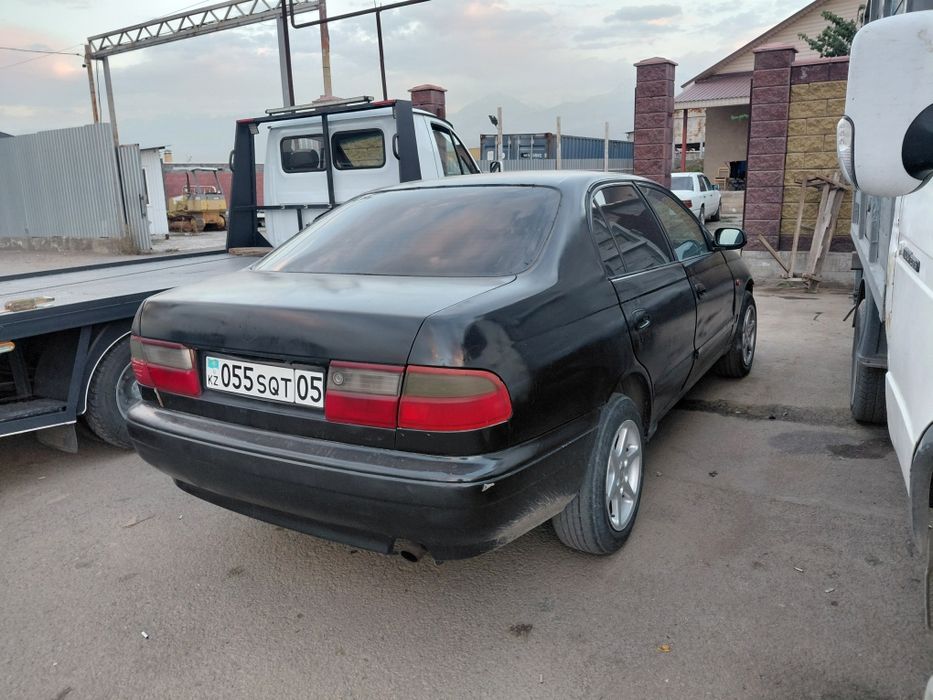 Продам тойота карина е