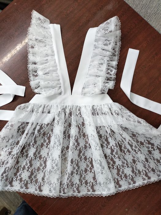 Новые школьные фартуки.