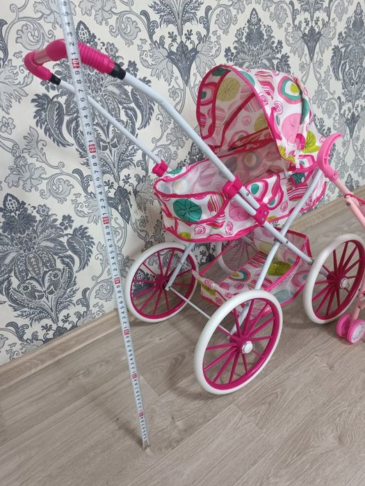 Игрушечная коляска для кукол