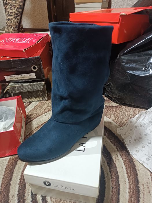 Зимние сапоги на плоской подошве