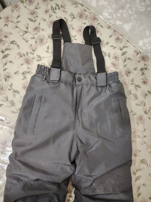 Продам новый  зимний комбинезон