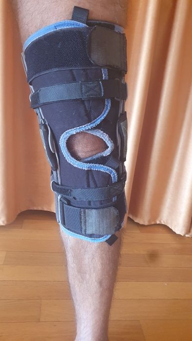 Orteza genunchiere cu tije picior stang