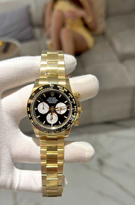 rolex daytona 40mm жълто злато / панда