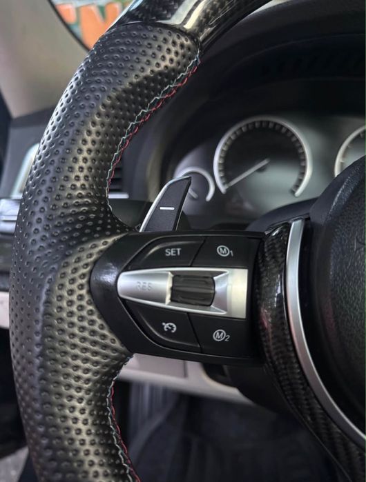 Vand Volan Carbon BMW cu padele Seria 5 F10 F11 F07 GT Seria 6 F06 F12 Seria 7 F01 X5 F15 X6 F16