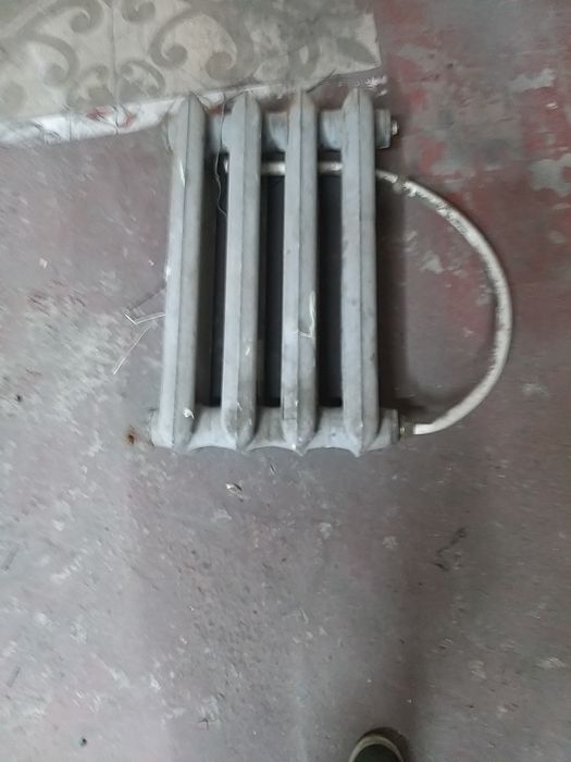 Продам радиатор  и регистры для отопления б/у