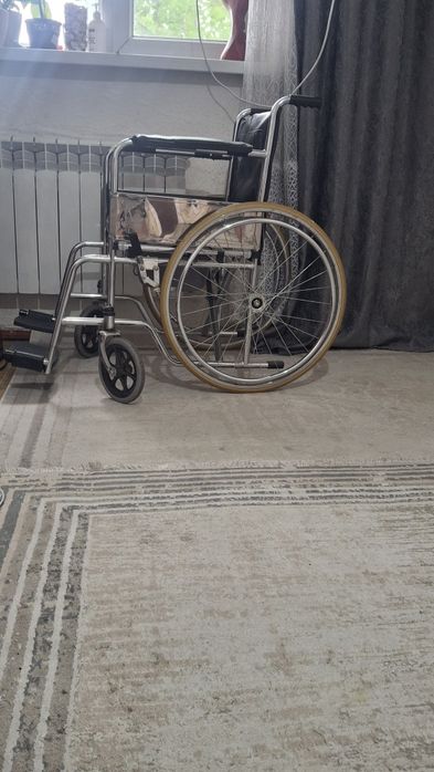 Инвалидная коляска с горшком