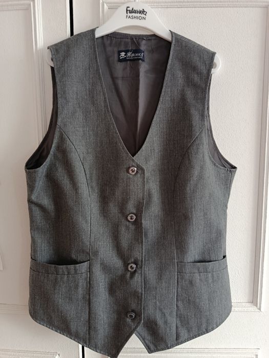 Продам жилет школьный