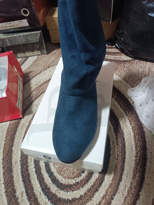 Зимние сапоги на плоской подошве