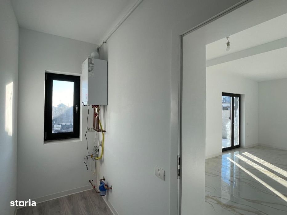 Duplex despartit prin camera tehnica  finisaje premium Mosnita
