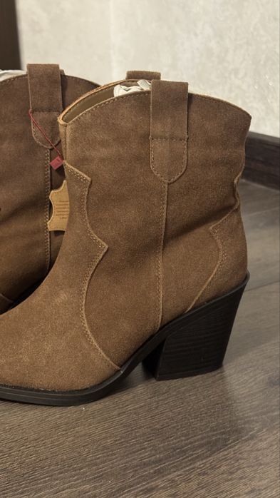 Продам новые сапоги