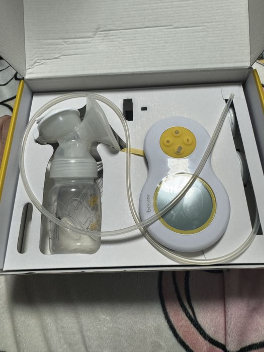 Электрический молокоотсос