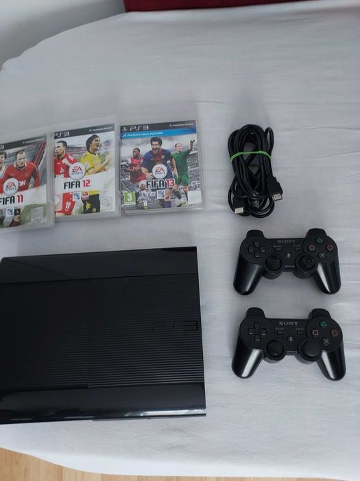 Ps3 super slim,cu 2 manete +jocuri