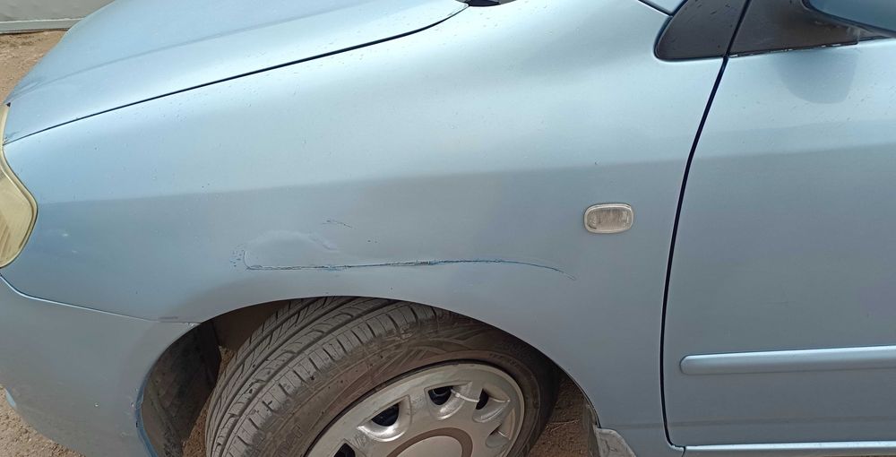 Toyota Corolla 2004 год