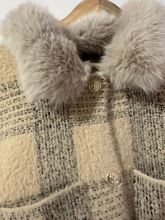 Дамска жилетка от естествен пух