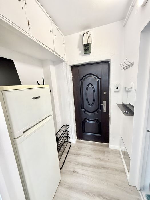 Garsoniera berceni grand arena proprietar