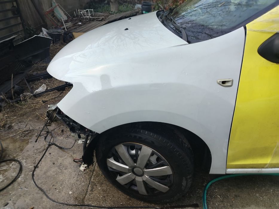 Aripa stânga fata Logan 2